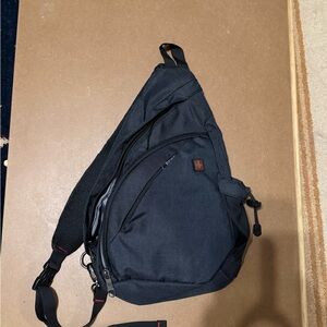 Swiss Tech Black Sling Backpack with Subtle Logo Patch